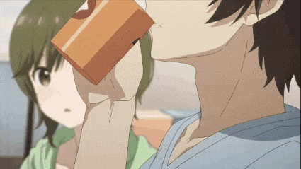 a man is drinking from a carton with a x on it