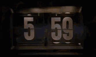 a person is looking at a clock that says 6:00