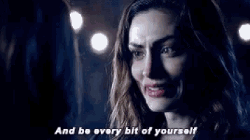 a woman is crying with the words " and be every bit of yourself " written below her