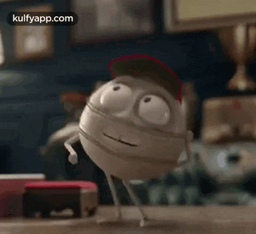 a cartoon character is standing on a table wearing a baseball cap and a mask .