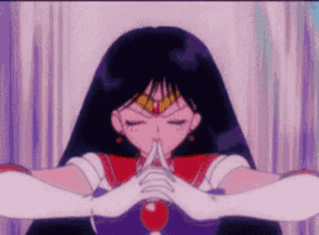 a close up of a cartoon character with her eyes closed and her hands together