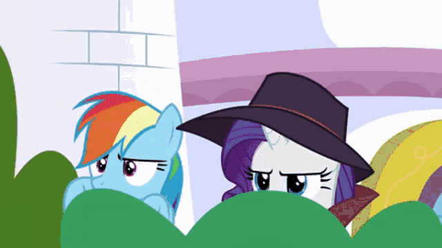 rainbow dash and rarity from my little pony peeking over a bush