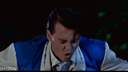 a man in a blue and white jacket with the words jaydendfpp17 on the bottom right