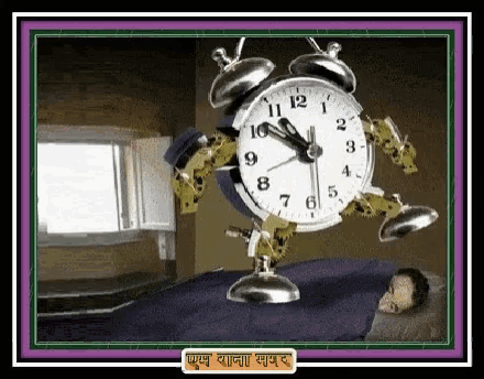 an alarm clock that has the hands on the numbers 1 and 12
