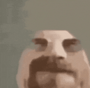 a close up of a person 's face with their mouth open and their eyes closed .