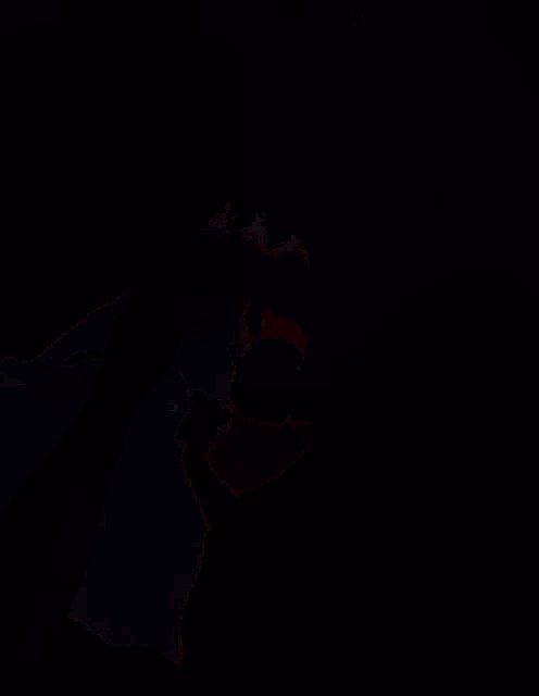 a close up of a person 's feet in a dark room