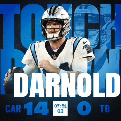 a poster for darnold shows him holding a ball