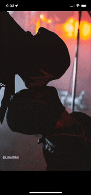 a phone screen shows a silhouette of a person with the time 9:03