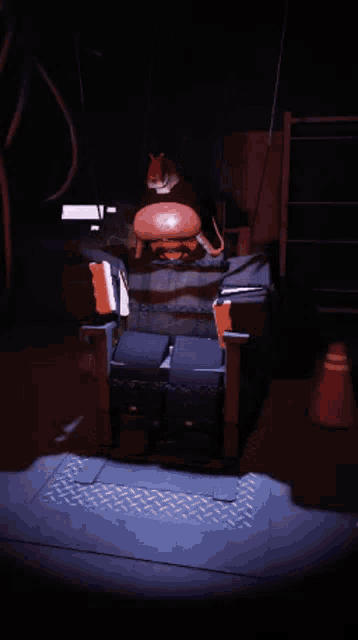 a man in a santa hat is sitting on a chair