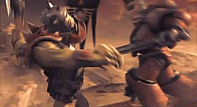 a group of cartoon characters are fighting each other in the desert .
