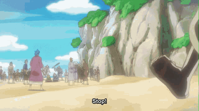 a group of people are standing on a sandy beach and one of them is saying " stop "