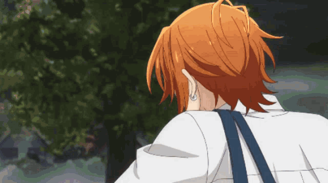a girl with orange hair is wearing earrings and a blue strap