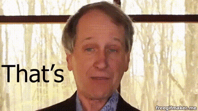 a man in a suit says that 's on the screen