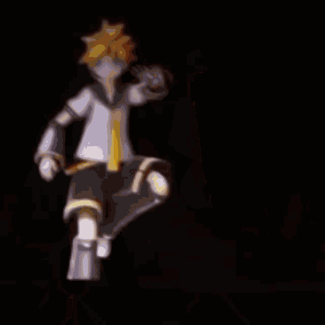 a cartoon character is dancing on a stage in the dark