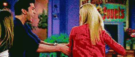 a man and a woman are holding hands in front of a fireplace that says ' squirrels '