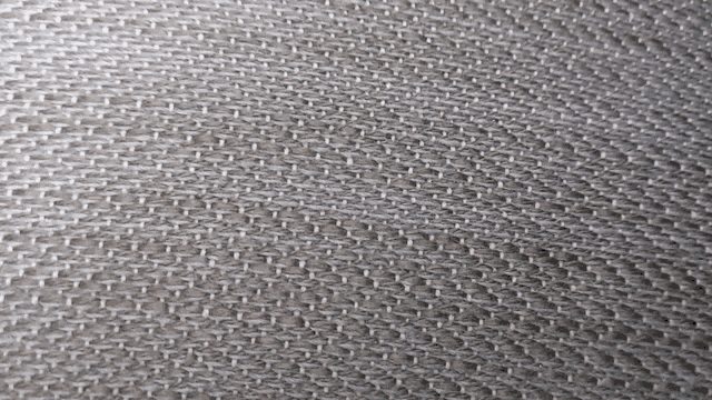 a close up of a piece of fabric with a diagonal pattern