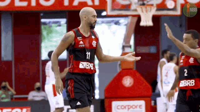 a basketball player with the number 11 on the back of his shirt