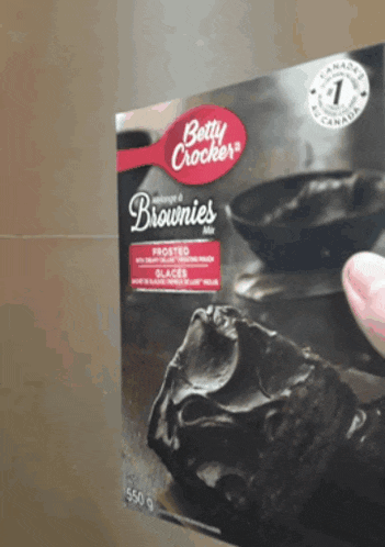a box of betty crocker frosted brownies sitting on a table