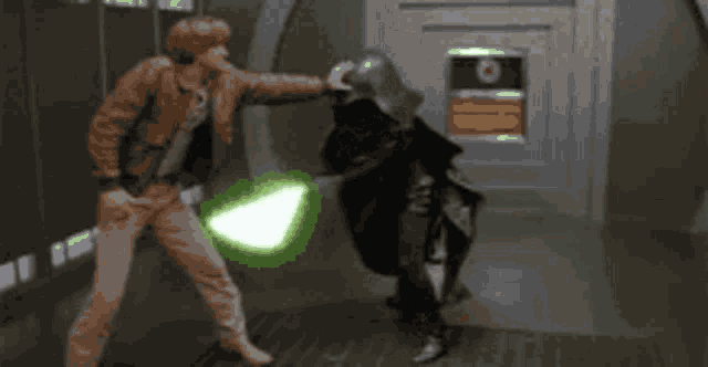 a man in a brown jacket is fighting another man with a green light saber