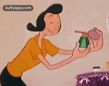 a cartoon character is holding a sponge in her hand and looking at it .