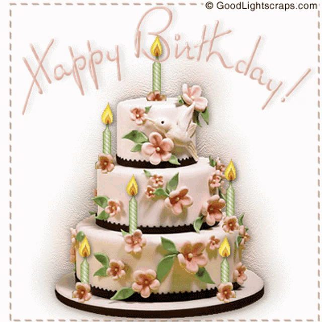 a birthday cake with flowers and candles and the words happy birthday written on it