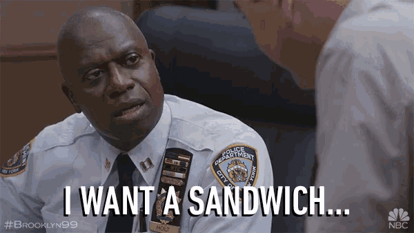 a man in a police uniform says " i want a sandwich " while talking to another man