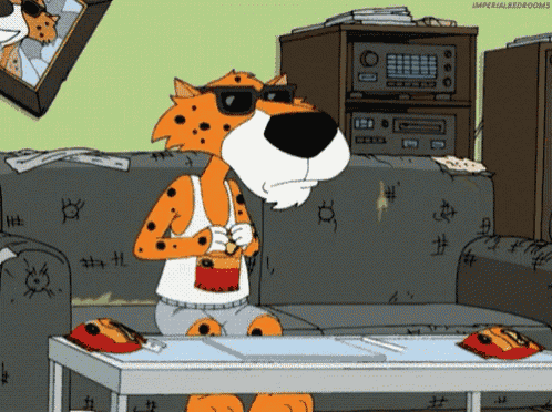 a cartoon cheetah is sitting on a couch eating a bag of chips