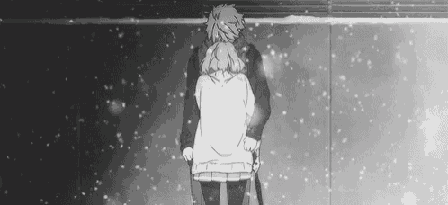 a black and white drawing of a man and a woman hugging in the snow .