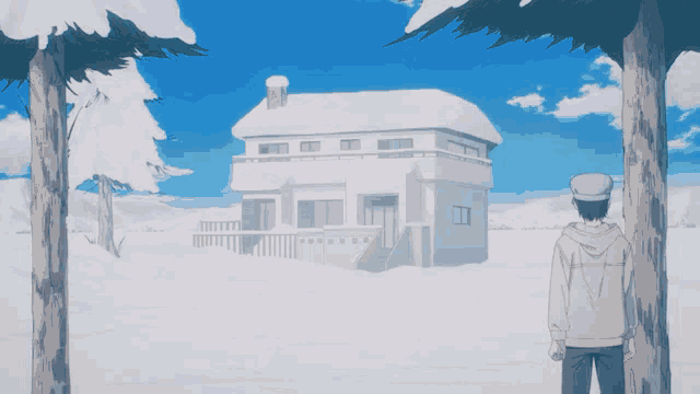 a man is standing in front of a snowy house