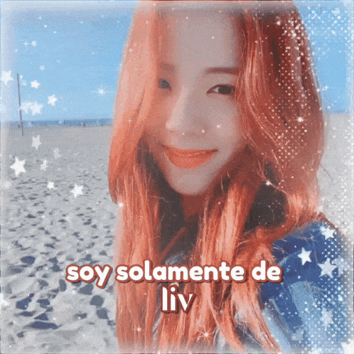 a picture of a woman with red hair and the words soy solamente de liv below her