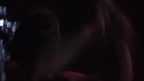 a close up of a person 's mouth with a mask on .