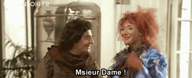a man and a woman are standing next to each other and the woman is saying msieur dame !