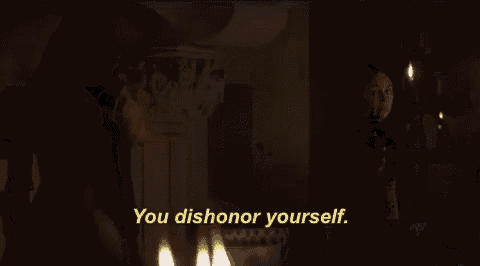 two women are standing in front of a fireplace and one of them is saying " you dishonour yourself "
