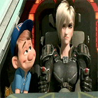 a boy and a woman are sitting next to each other in a room .