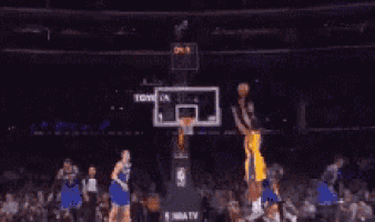 a basketball player is standing in front of a basketball hoop with the words `` nailed it '' written on the bottom .