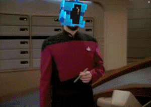 a man in a star trek uniform with a blue cube on his head holding a pen