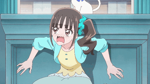 a girl with a surprised look on her face is sitting in front of a window