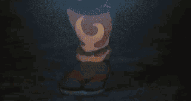 a blurred image of a fire with the letter g visible