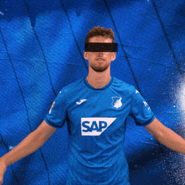 a man in a blue shirt that says sap on it