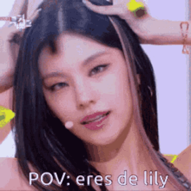 a close up of a woman 's face with the words pov : eres de lily written on the bottom .