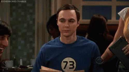 a man in a blue shirt with the number 73 on it