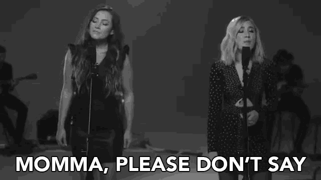 two women singing in front of microphones with the words momma please don 't say above them