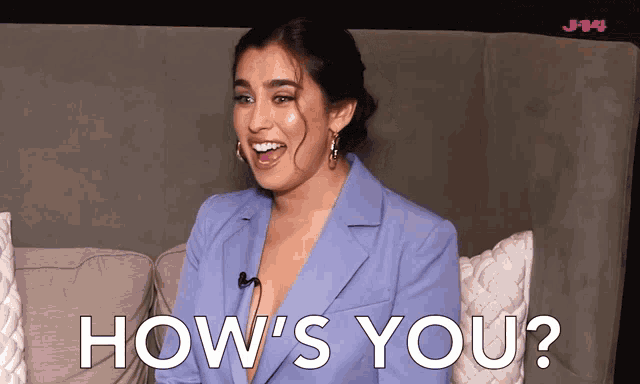 a woman sitting on a couch with the words " how 's you " written in white