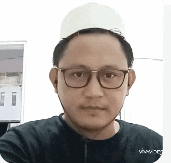 a man wearing glasses and a hat is taking a selfie .